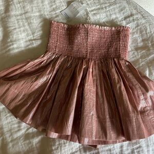Brand new, never worn shop KOCH skirt. Authentic and tag still on.